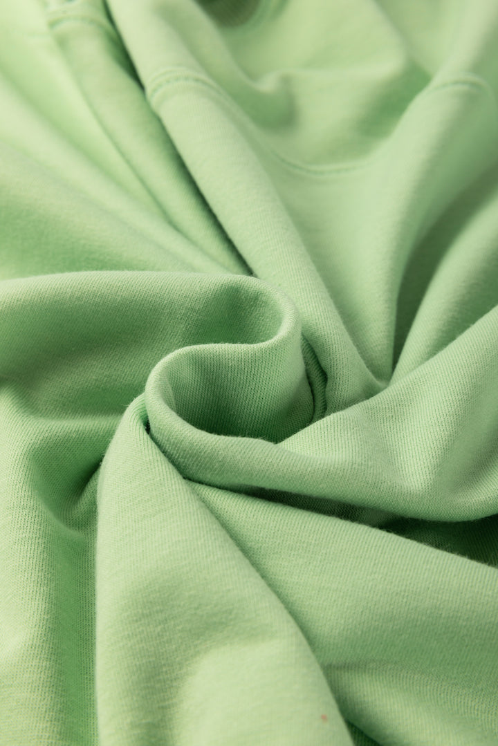 Meadow Mist Green Plus Size V Neck Drop Shoulder Tee Loose Shorts 2pcs Outfit