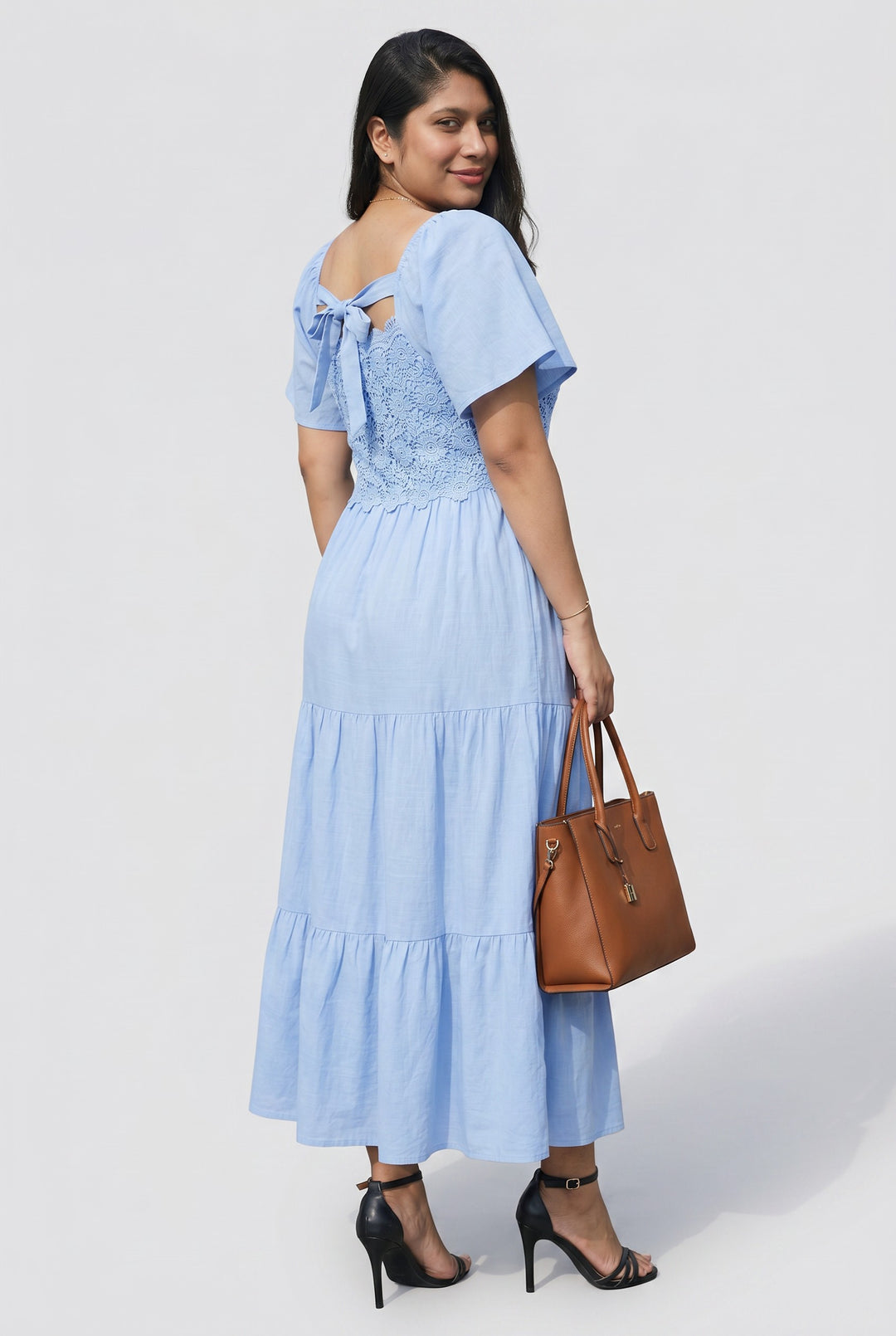 Errabelly light blue midi dress with short flutter sleeves, square neck, lace bodice, and tiered skirt. Back tie detail.