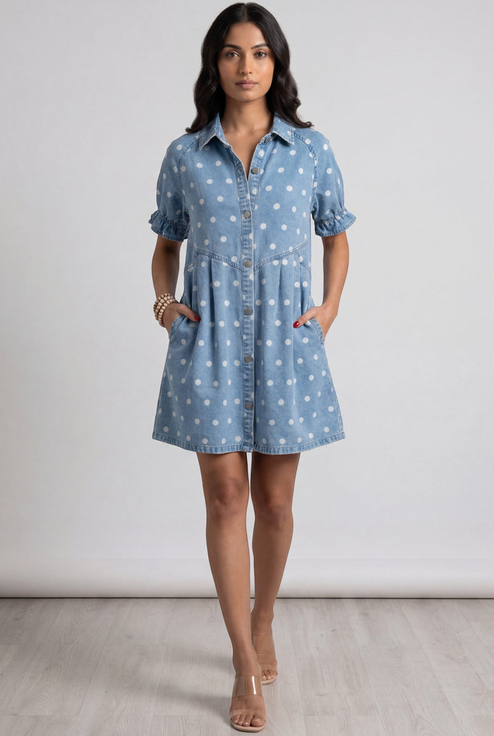 Errabelly light blue denim dress with white polka dots, short puff sleeves, and button-down front.