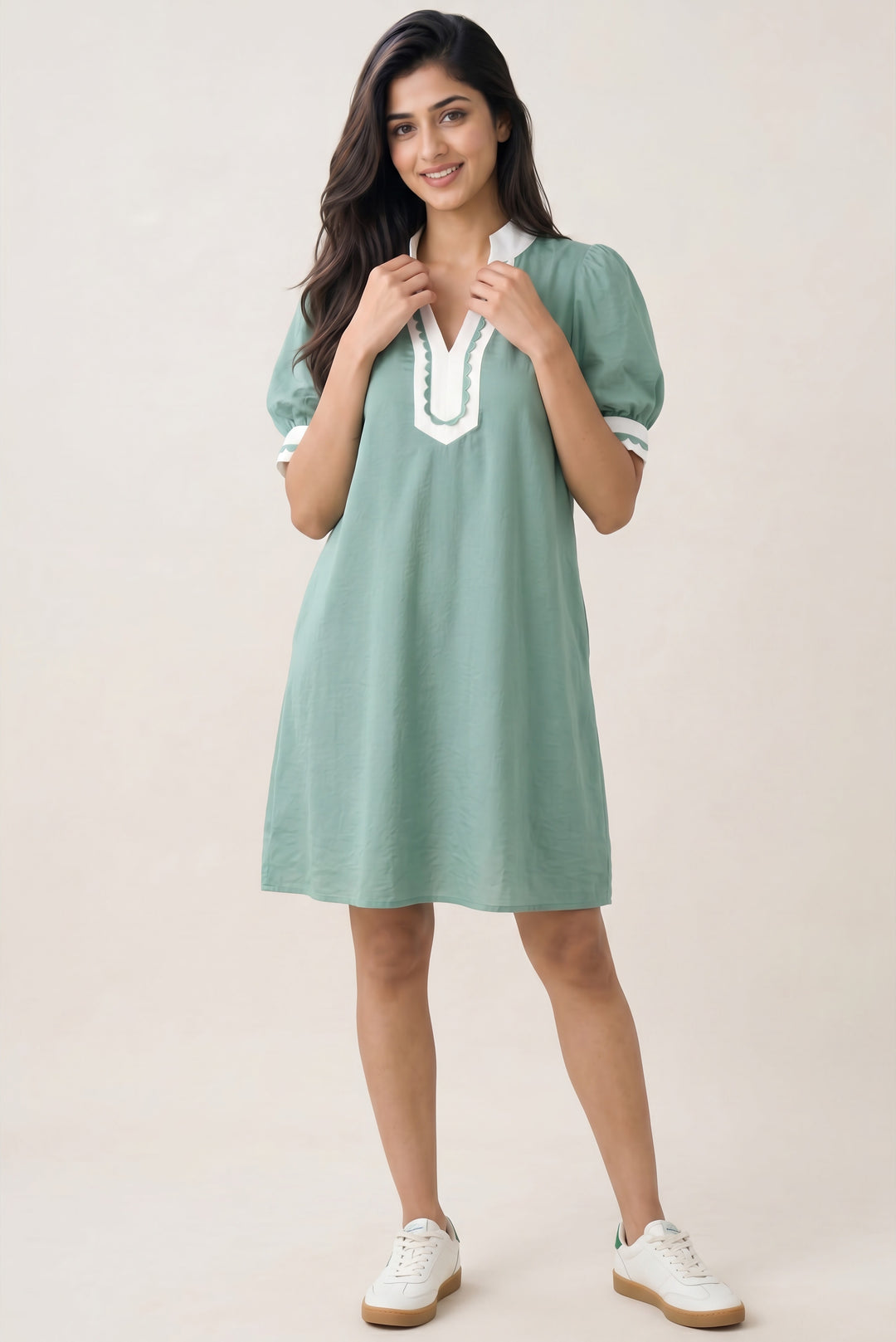 Errabelly green cotton-blend mini dress with white scalloped trim on the V-neck and puff sleeves.