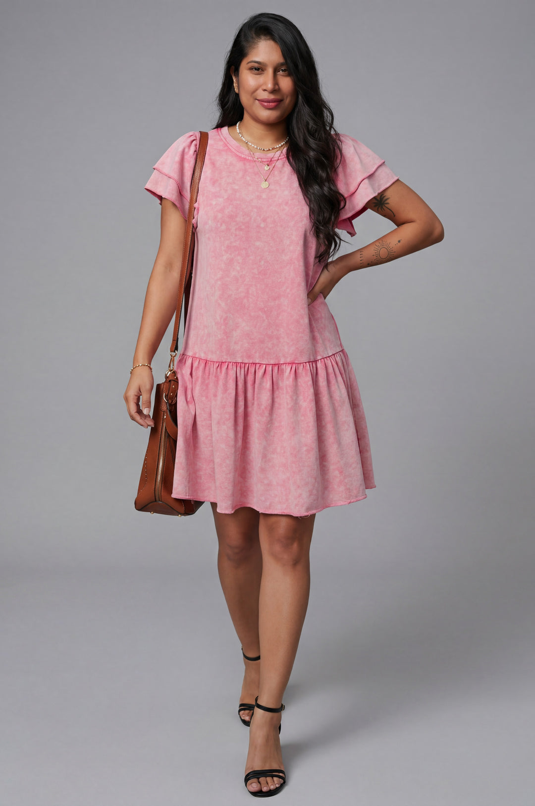 Errabelly pink mineral wash mini dress with ruffled short sleeves and a tiered flounce hem.