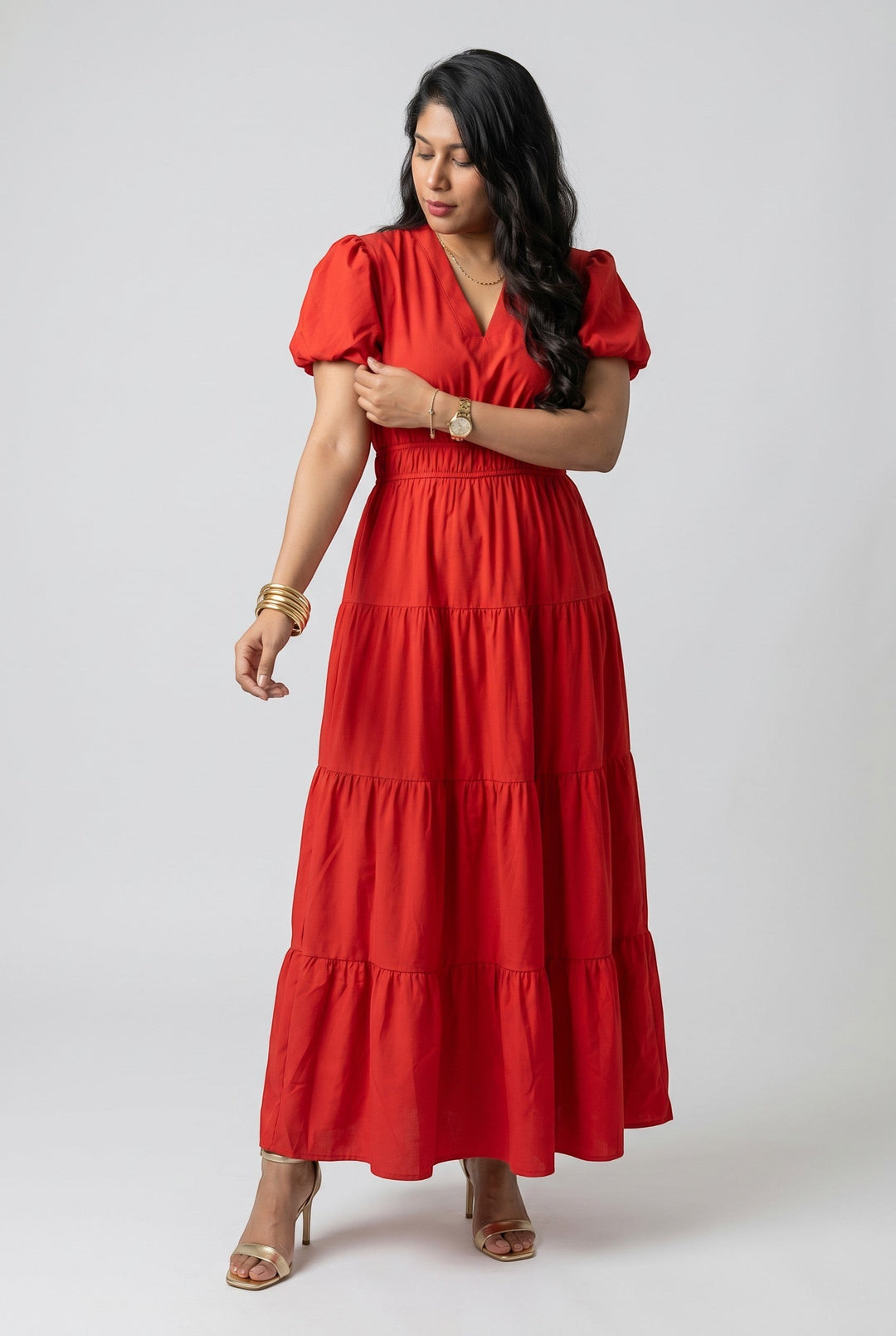 Errabelly red solid color V neck short puff sleeve high waist tiered maxi dress with a flowing skirt.